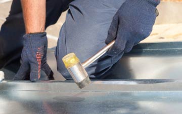 Carnteel metal flat roofing repairs